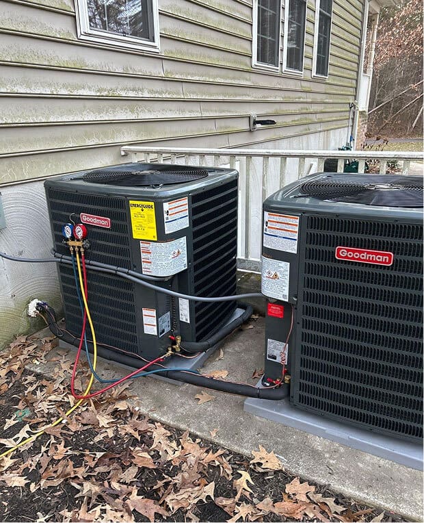 Dual Goodman AC units outside home